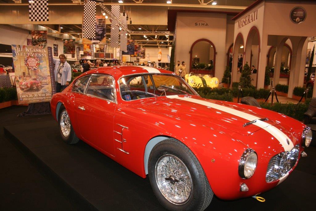 CC with event poster TECHNO CLASSICA 2014 and Maserati